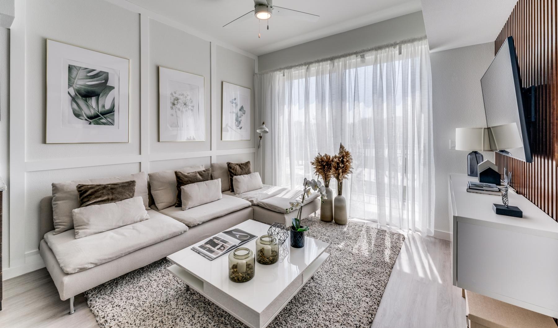 a living room with a white couch